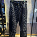 pantalones vaqueros Louis Vuitton x Nigo Monogram Crazy Denim en color negro.